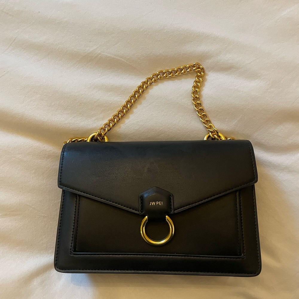 JWPEI NWT black bag. Never worn.